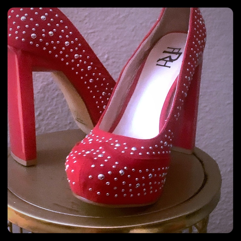 Nice red studded heels. Never worn